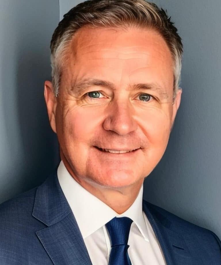 Professional portrait of Simon Millington in a suit for Raw Horizons.