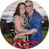 Robert and Deanna smiling outdoors in casual attire.
