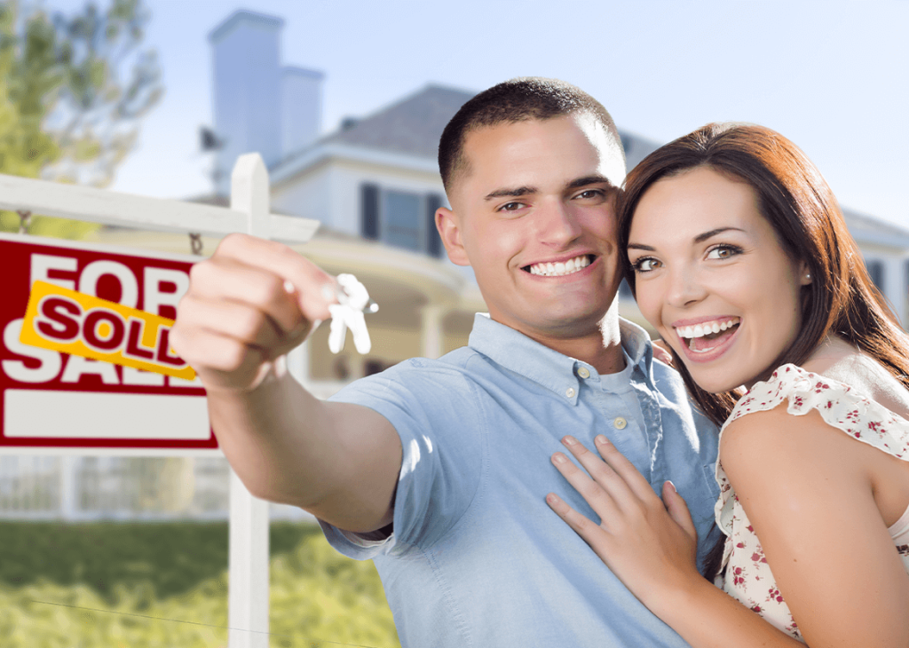 young couple closing on first home