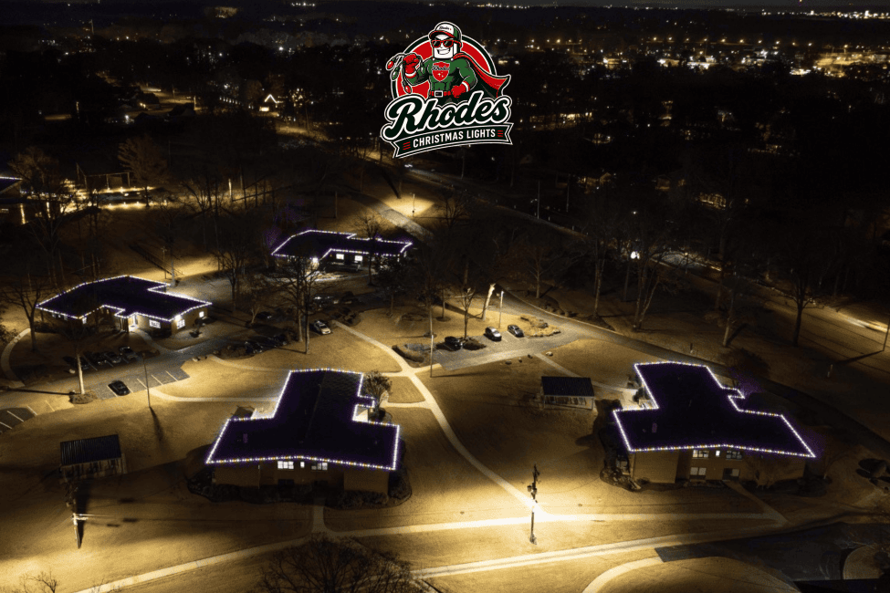 Night view of Rhodes Christmas Lights with illuminated buildings and festive decorations.