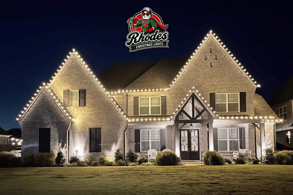 Beautiful house decorated with bright Christmas lights at night.