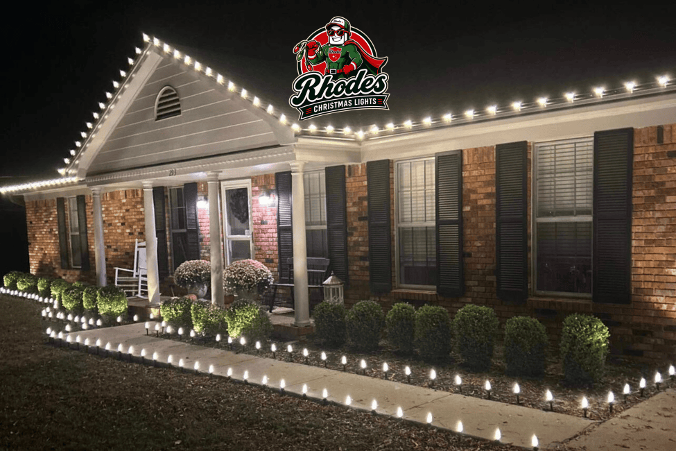 Home decorated with Christmas lights and holiday lighting at night.