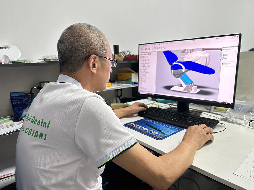 RIXI staff member working with a three-dimensional dental chair CAD model