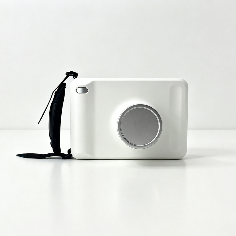 Camera-style dental X-ray unit with carrying strap
