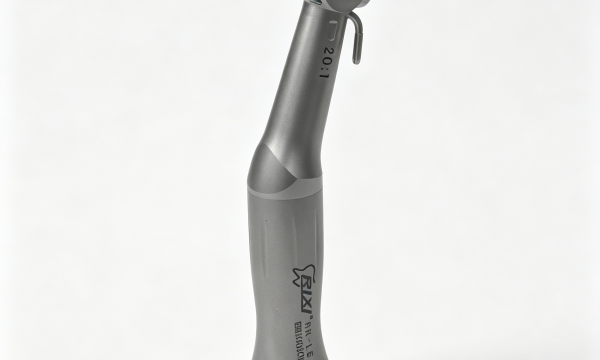 Side view of a RIXI contra-angle handpiece with a green identification band and irrigation connection
