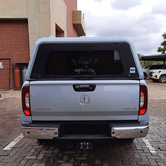 Customized stainless steel canopies for Mercedes-Benz X-Class trucks by RLD Design, durable and sleek metal coverings for added functionality and style.
