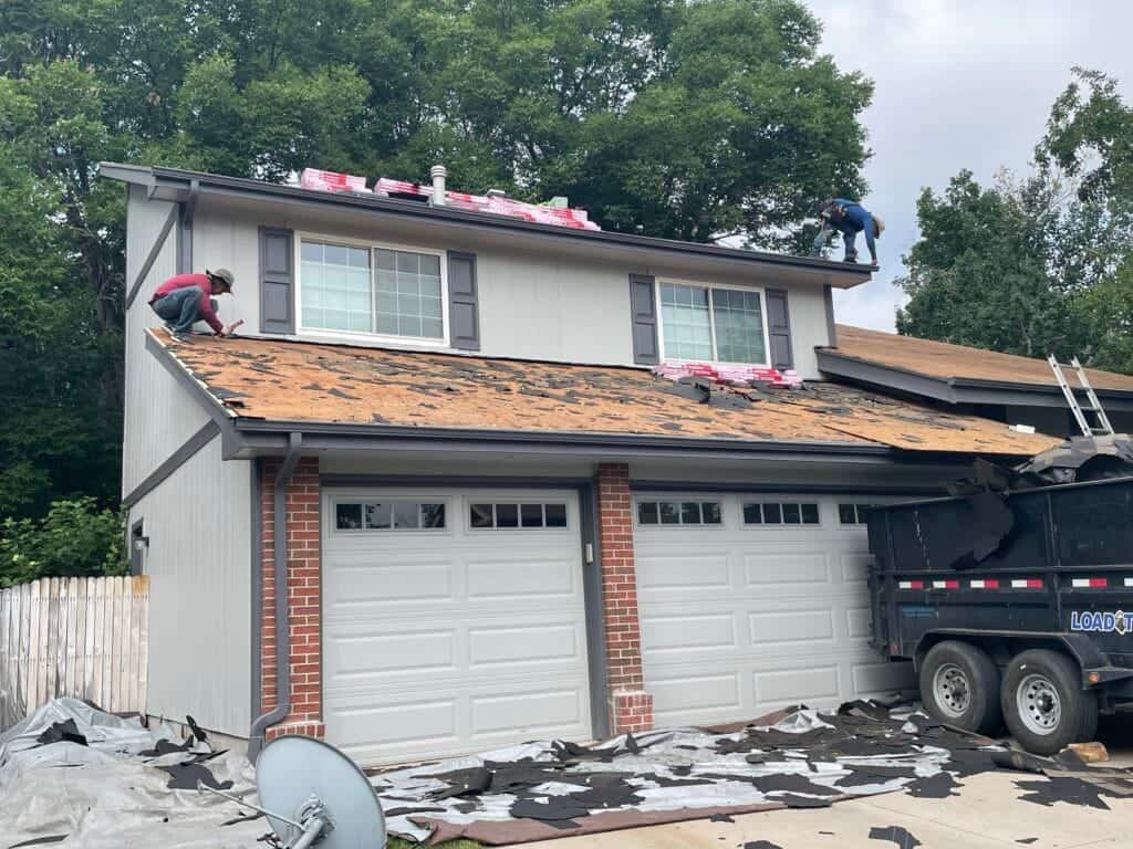 Road Home Exteriors crew installing a new roof on a home in Highlands Ranch, Colorado