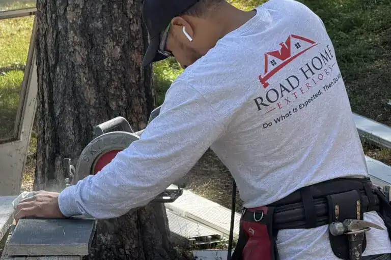 Road Home Exteriors crew installing James Hardie or LP SmartSide siding in Colorado