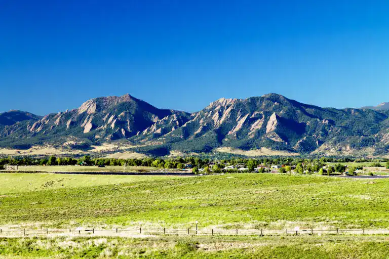 View of Superior Colorado and the Flatirons representing roofing, siding, window replacement, wildfire mitigation, and exterior remodeling services in Boulder County.