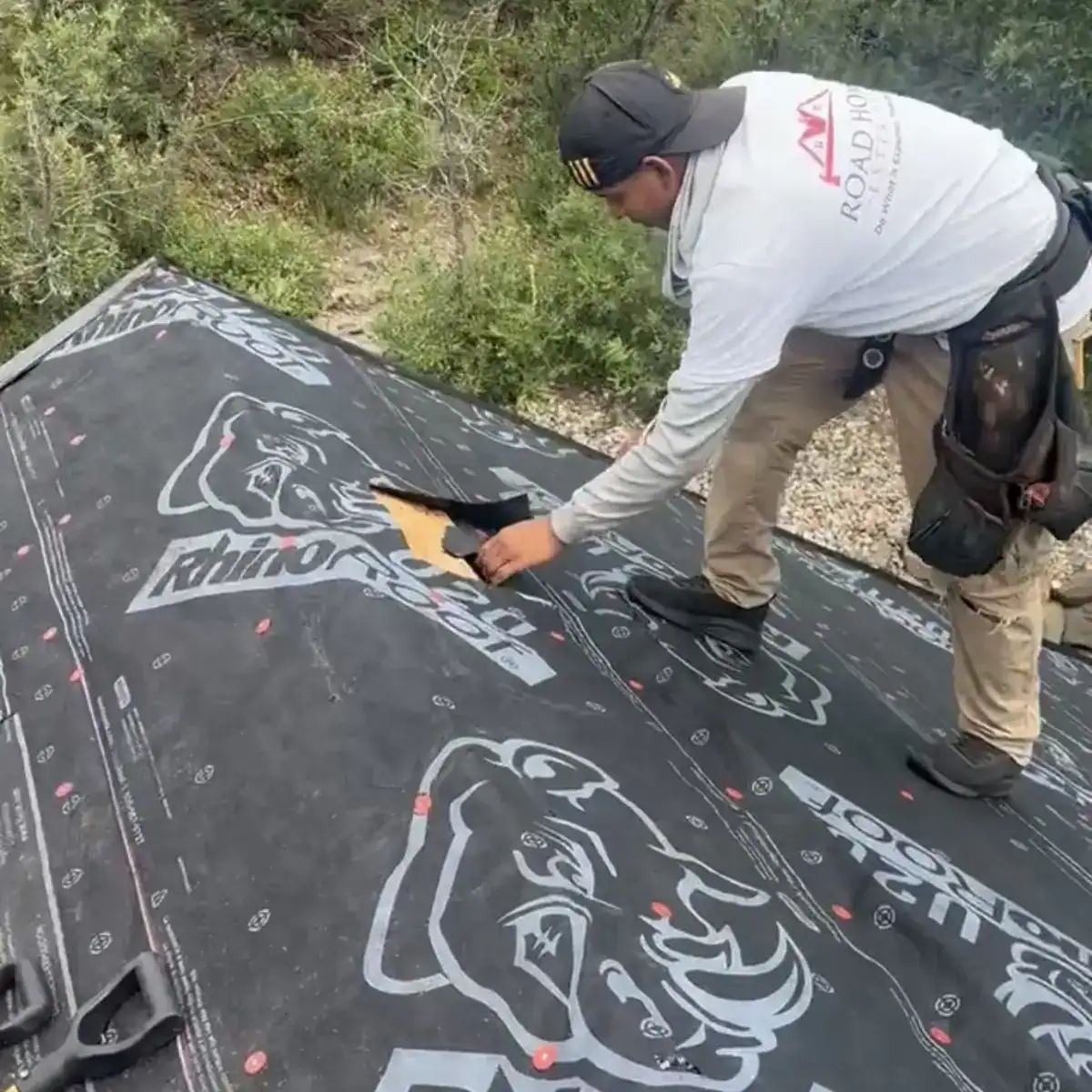 Road Home Exteriors installer preparing an Owens Corning roofing system with premium synthetic underlayment during a roof replacement in Golden, Colorado.