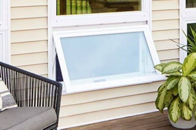 Pella Impervia awning window installed by Road Home Exteriors in Colorado.