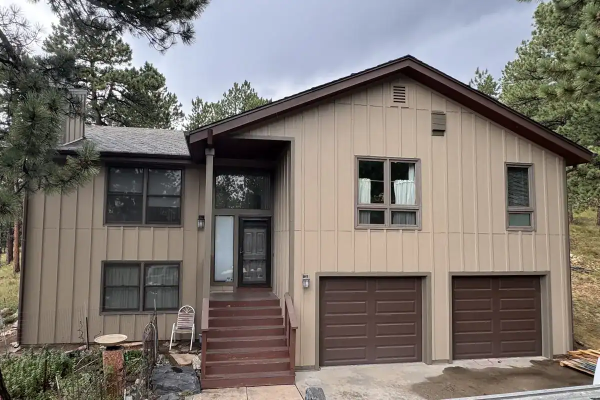 Khaki Brown James Hardie board-and-batten siding on an Evergreen Colorado home in Hiwan Estates