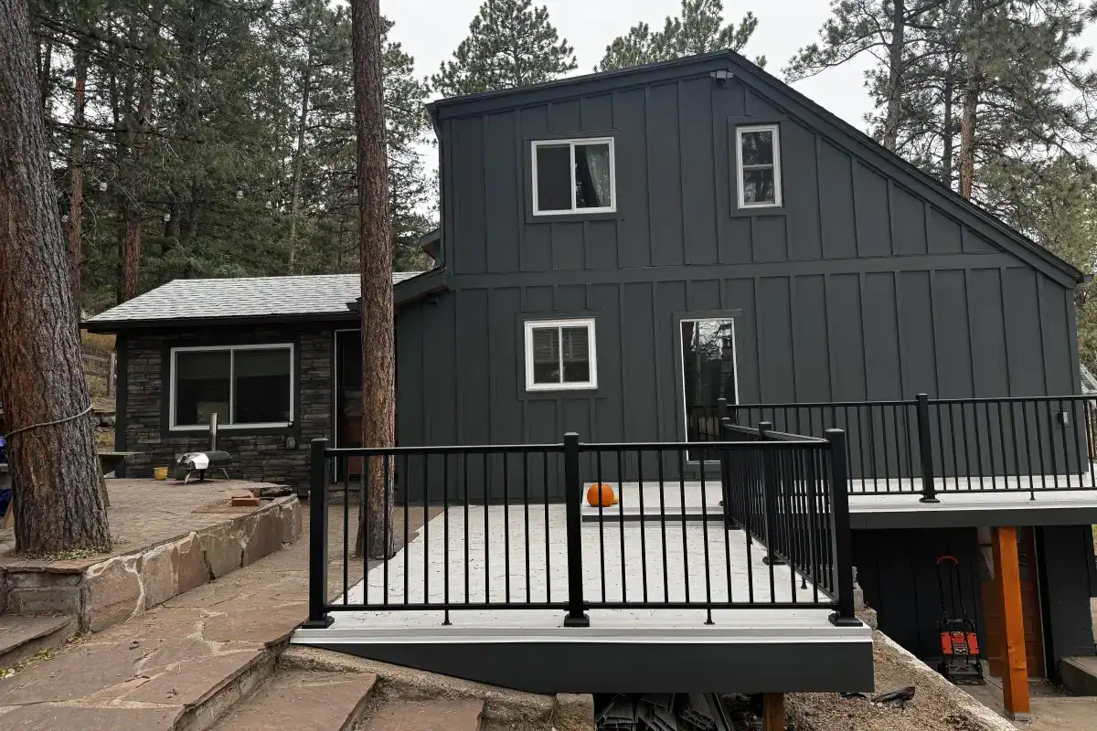 Iron Gray James Hardie board-and-batten siding on an Indian Hills Colorado home near Mount Falcon