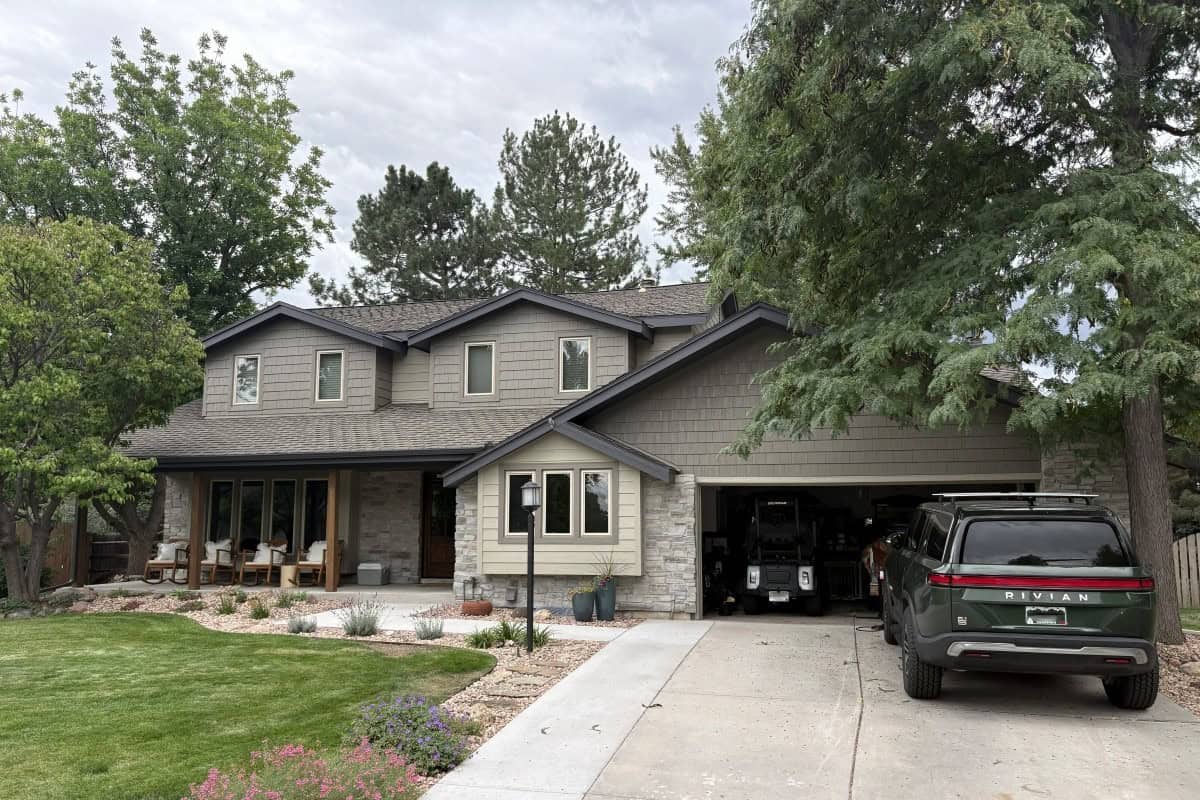 Heritage Village home in Centennial with neutral-toned LP SmartSide lap and shake siding and stone accents