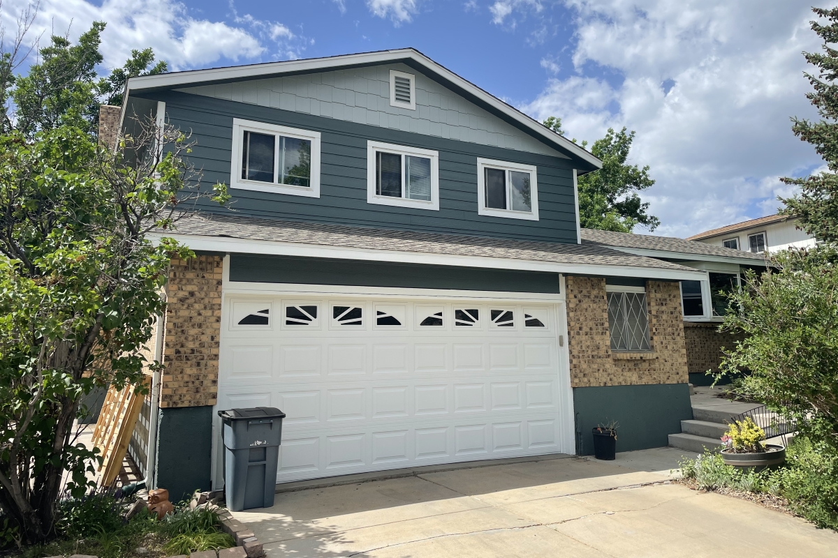 Westminster home near Westminster City Park with LP SmartSide lap and shake siding installed by Road Home Exteriors