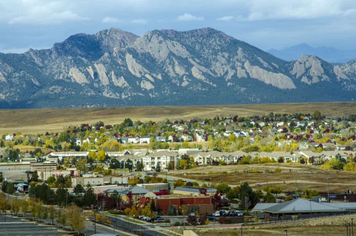 Colorado Front Range community with homes and the Flatirons rising in the background