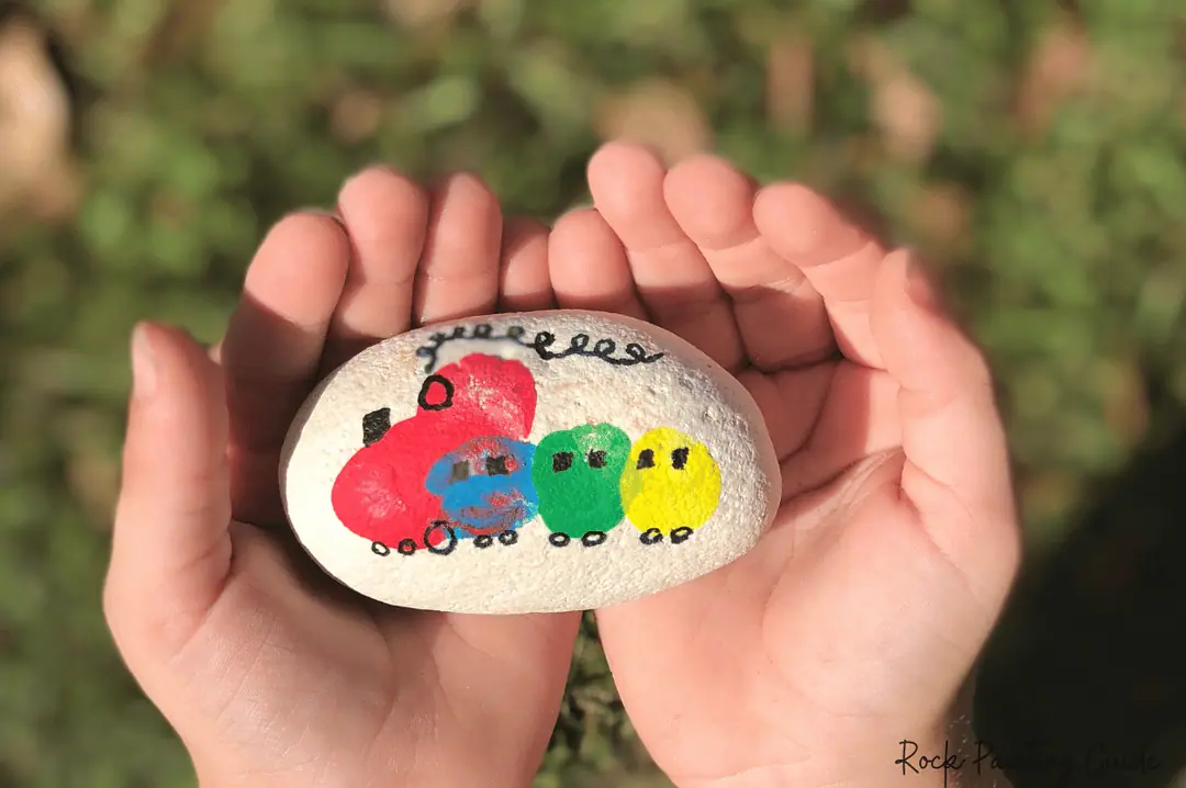 27 Fun Rock Painting Ideas For Preschoolers, No PaintBrush Required! 4 train painted rock