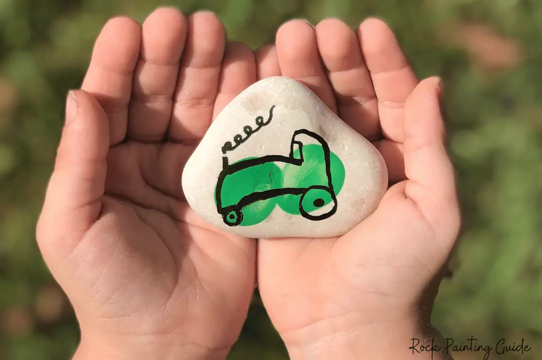 27 Fun Rock Painting Ideas For Preschoolers, No PaintBrush Required! 6 green tractor painted rock