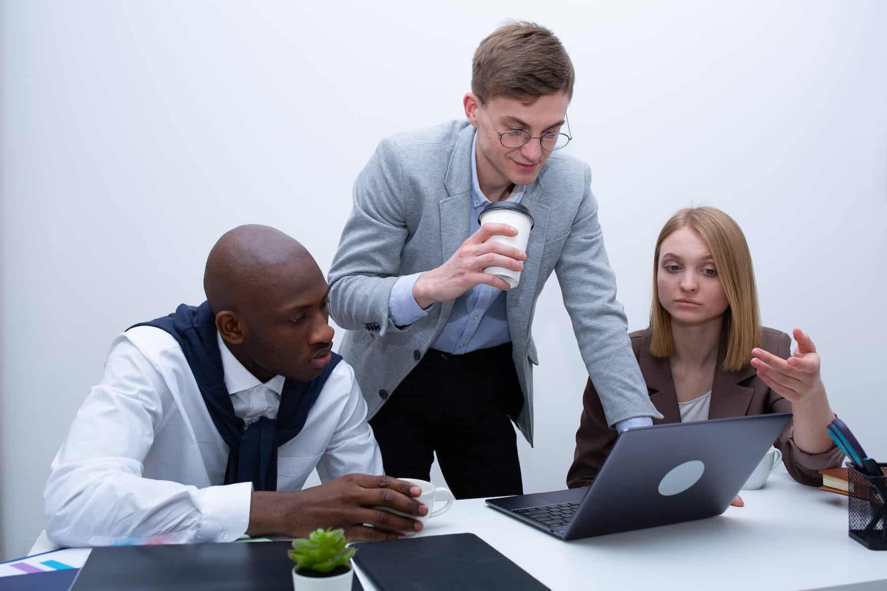 men and a woman having discussion together
