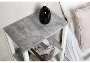 Eleganten sängbord i betongfinish med förvaring, perfekt för moderna sovrum.