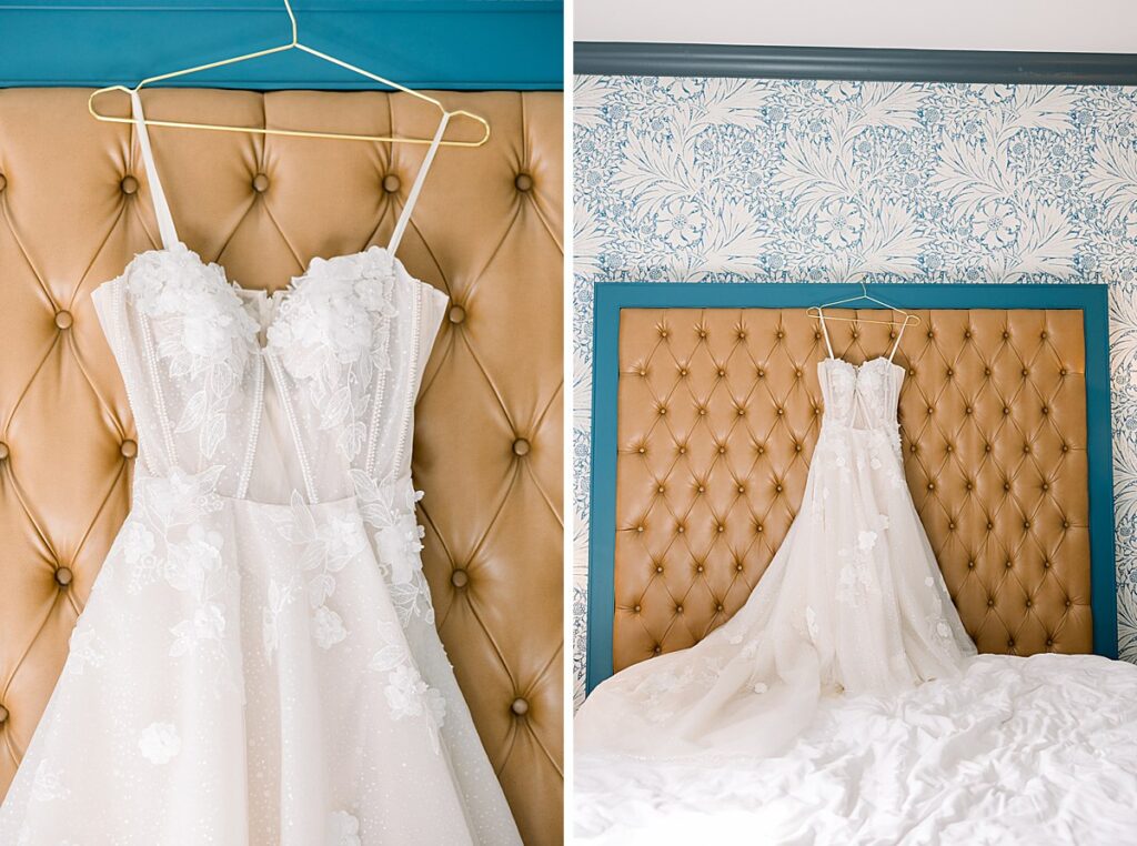 a wedding dress hanging on a hotel bed frame