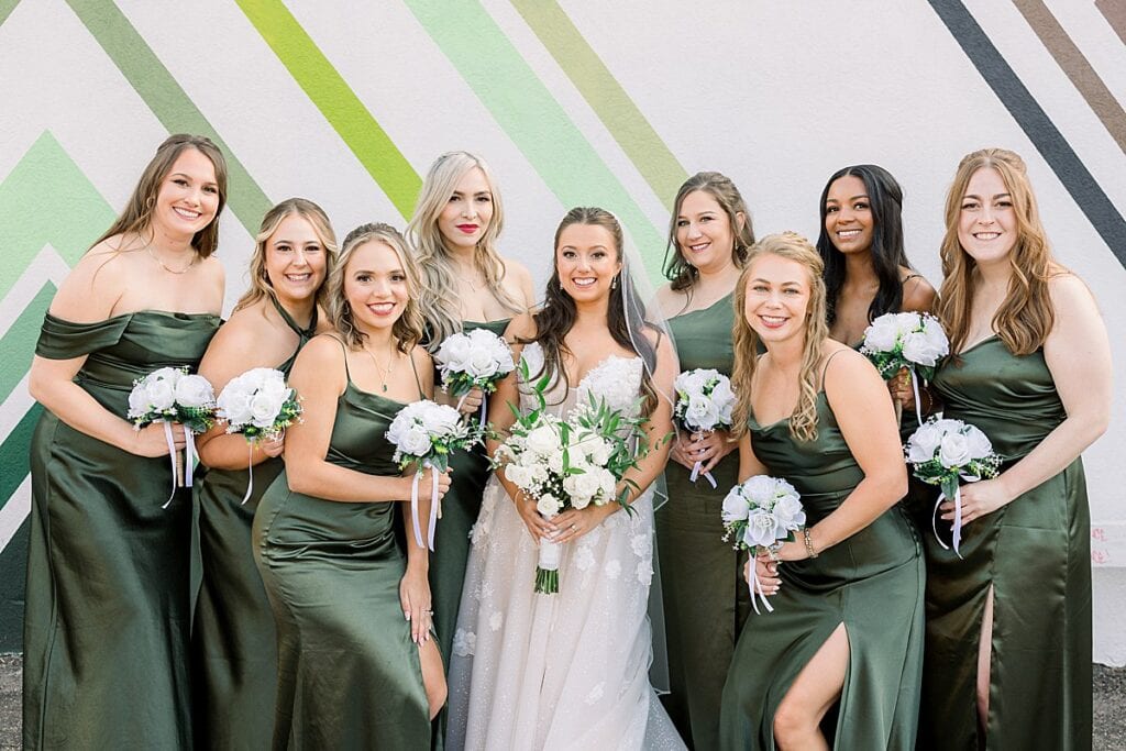 Bride and bridesmaids smiling
