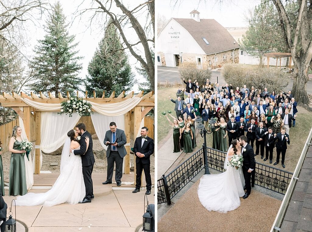 Bride and Groom sharing kiss with family and friends cheering in background