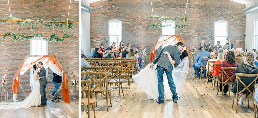 Bride and Groom sharing kiss midway down the isle