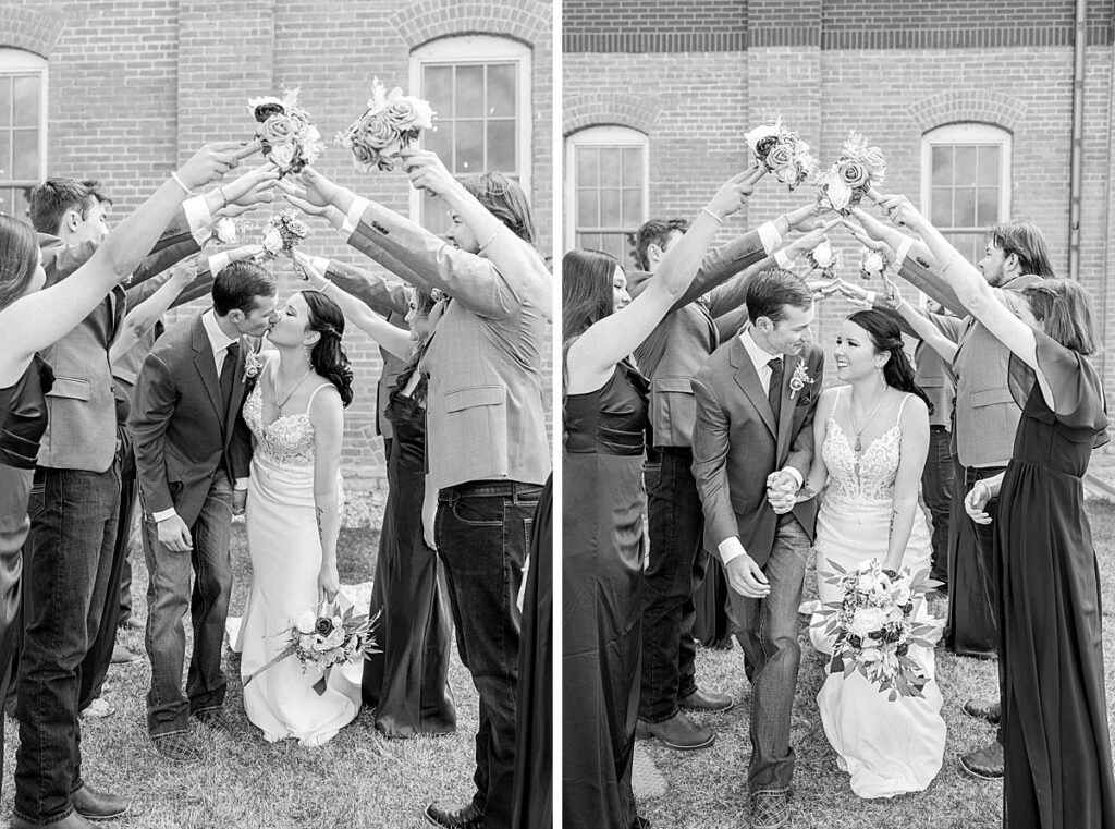 Bridal party making tunnel for bride and groom to walk through