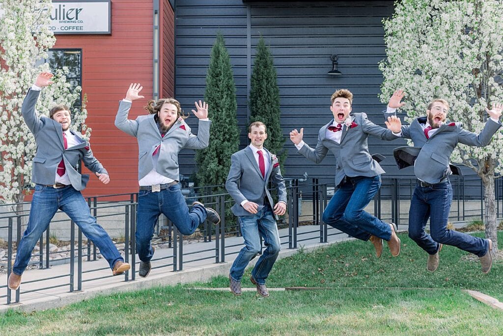 Groom and Groomsmen jumping in the air