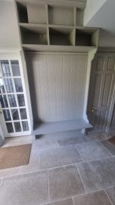 Elegant built-in grey storage unit with bench for home interiors - S Bond Decorating.