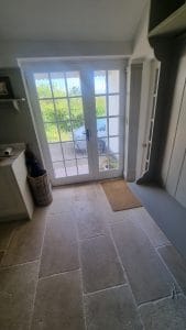 Bright white double-glazed door with frosted glass in a modern interior.