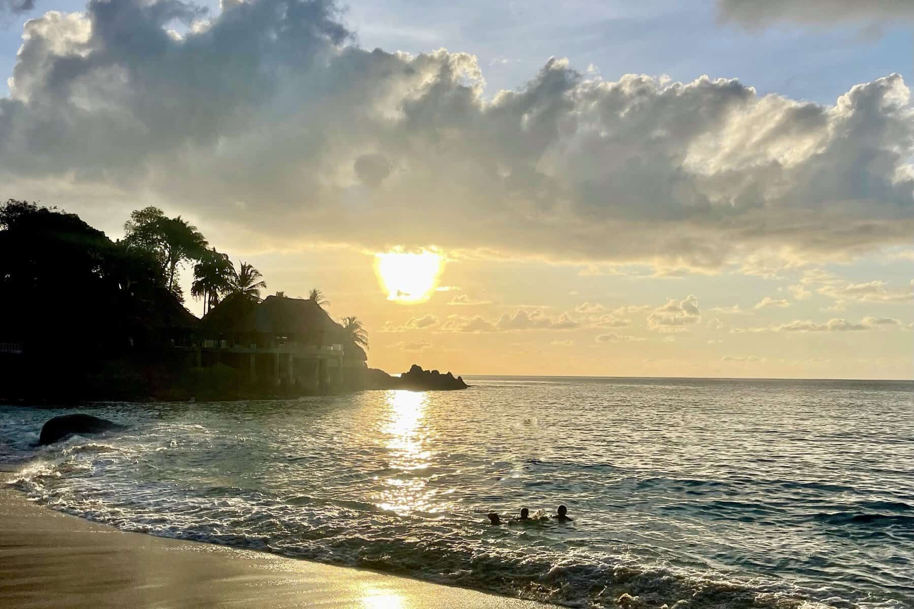 Sunset Beach Mahé Seychelles calm water granite rocks sunset