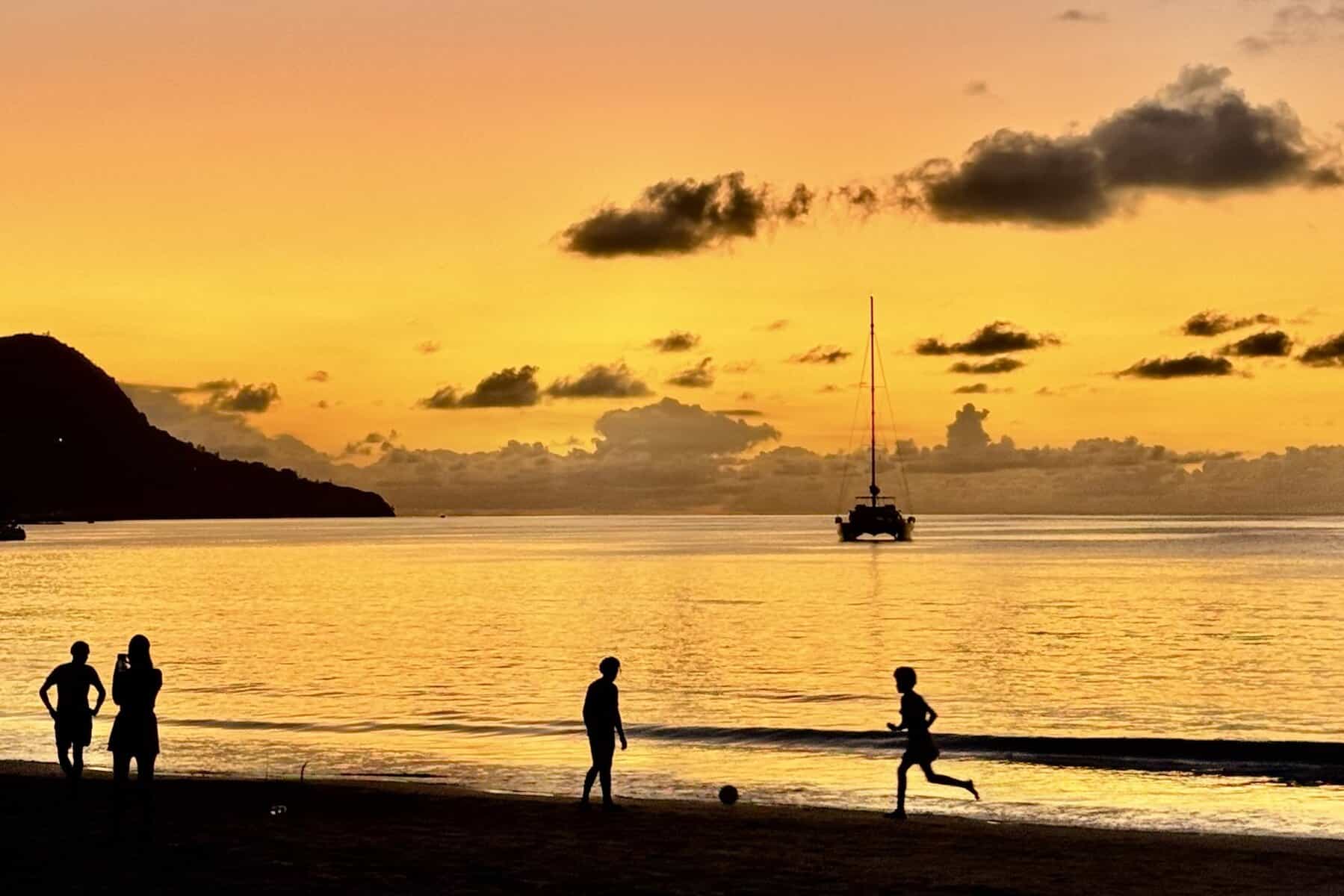 Beau Vallon Beach Mahé Seychelles long lively bay with calm water and sunset atmosphere
