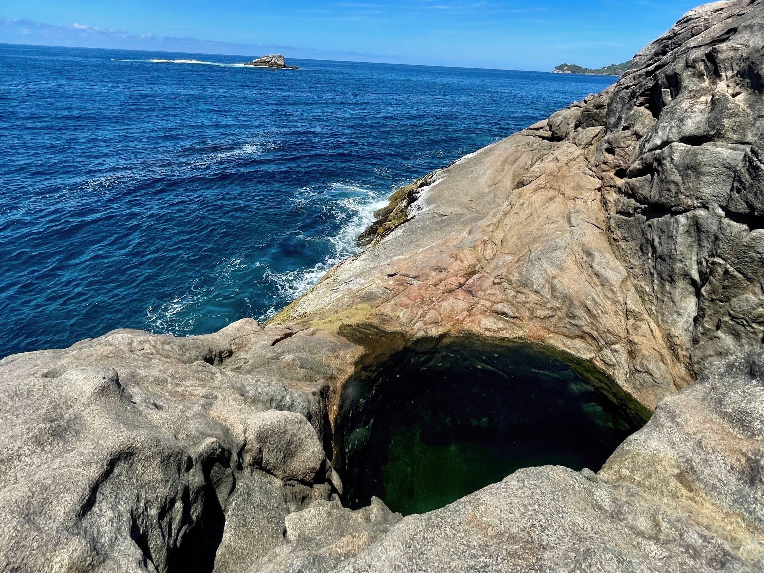 Ros Sodyer natural rock pool set into granite beside the sea on Mahé