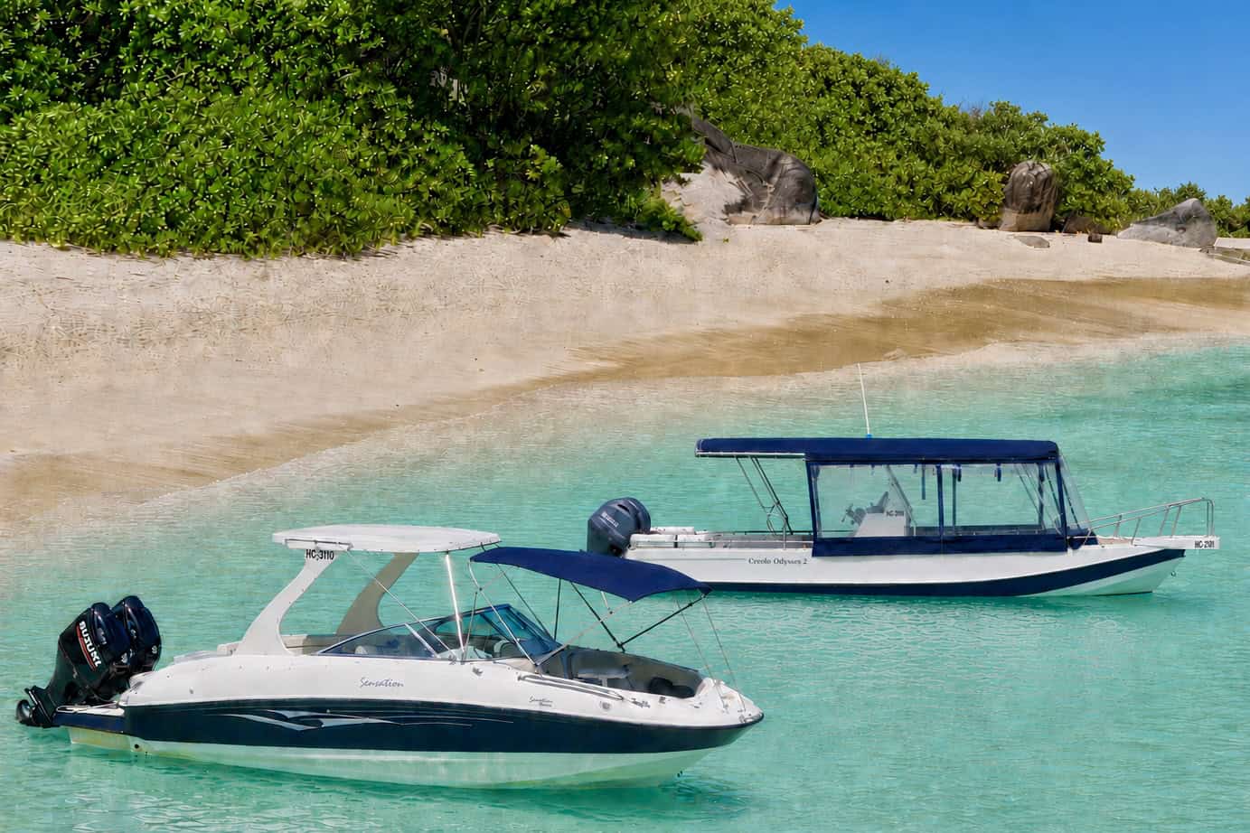 The two Creole Odyssea boats in turquoise water near Mahé, Seychelles