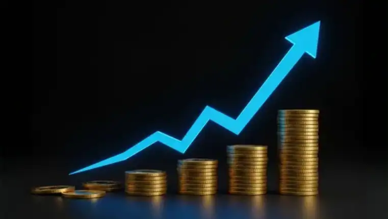 Growing financial graph with rising stack of coins.