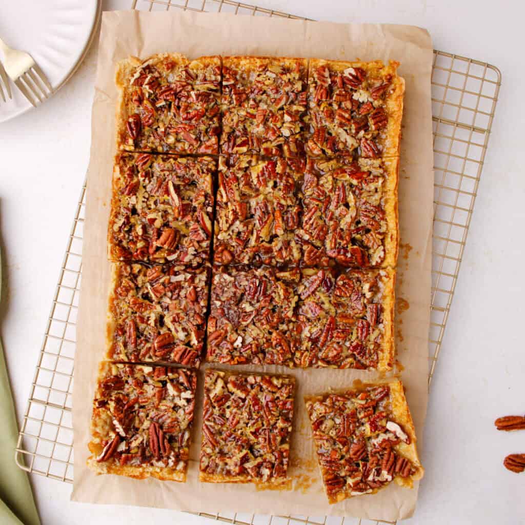 Cut pecan pie bars with shortbread crust.