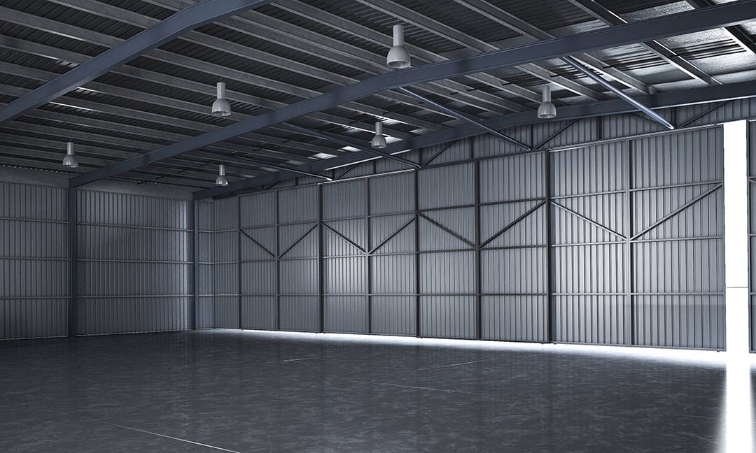 A warehouse interior fitted with roller shutter doors