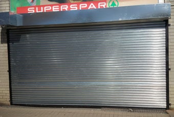A roller shutter door on a retail building