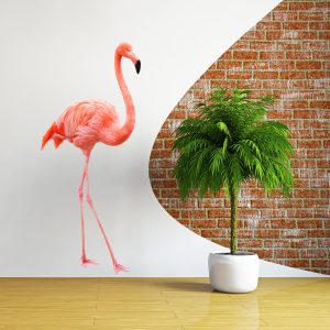 Flamingo wall sticker in a modern interior beside a potted plant