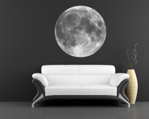 Full moon wall sticker displayed above a white sofa on a dark modern interior wall