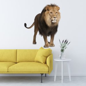 Lion wall sticker above a yellow sofa in a modern living room