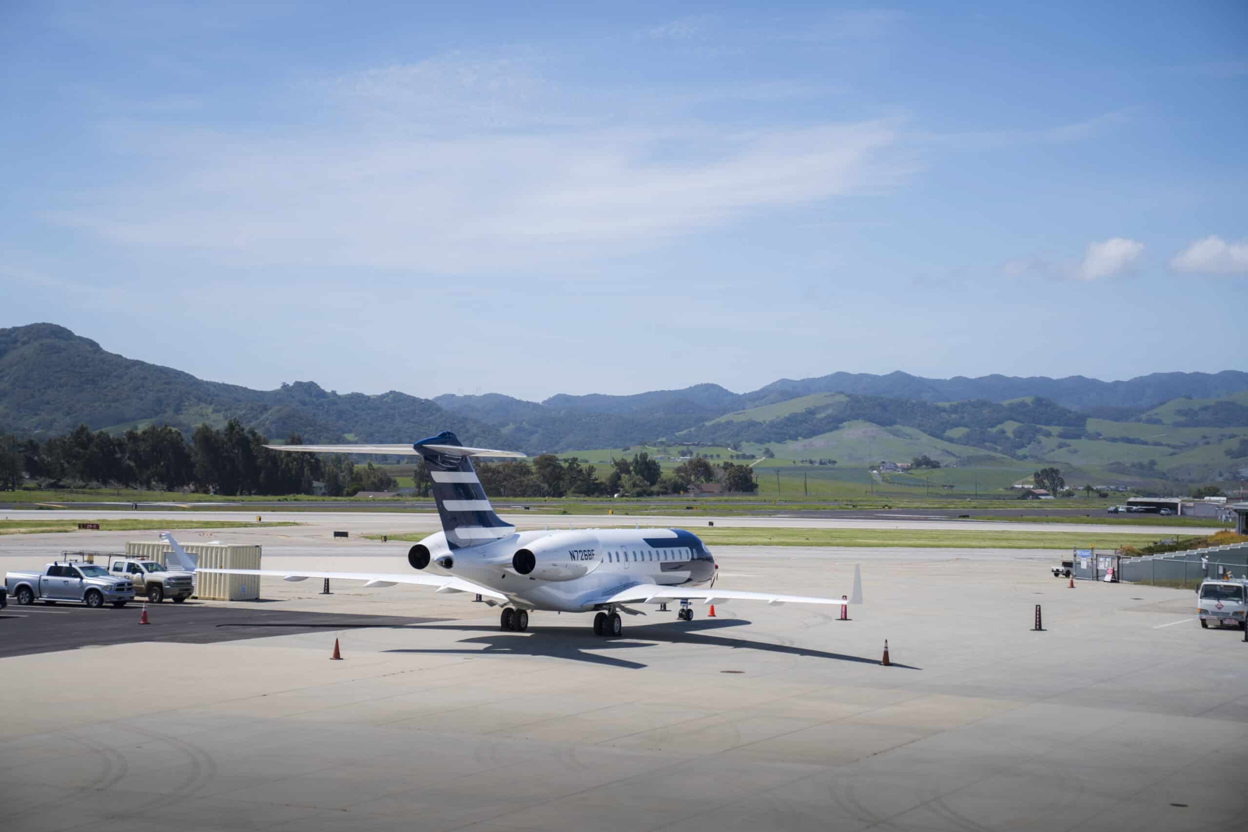 Small jet on scenic SLO airport runway