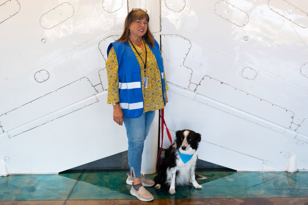 SBPaws therapy dog Luna with its handler