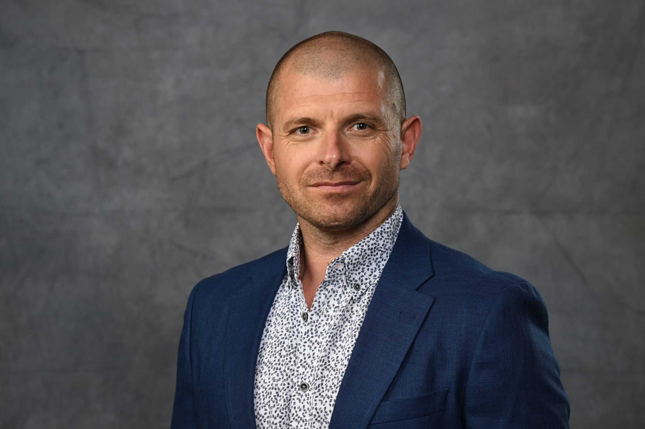 Headshot of Tim O'Keefe