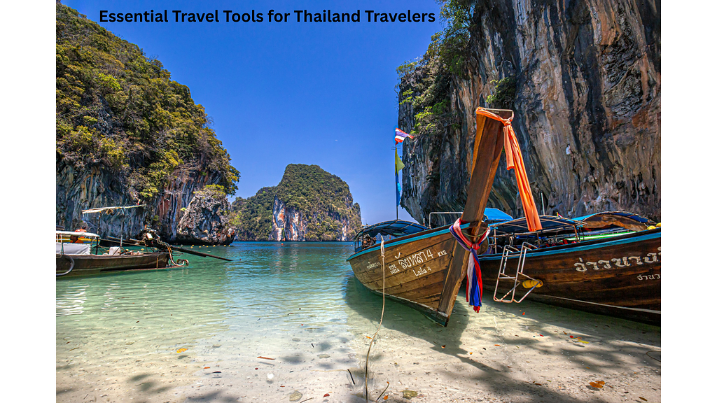 Traditional longtail boats on clear waters in Thailand's scenic bay.