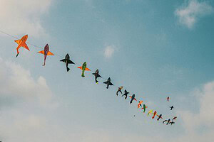Thailand International Kite Festival Near Hua Hin: Colorful Sky Event You Should Not Miss 5 Colorful kites flying high at the Thailand International Kite Festival near Hua Hin.
