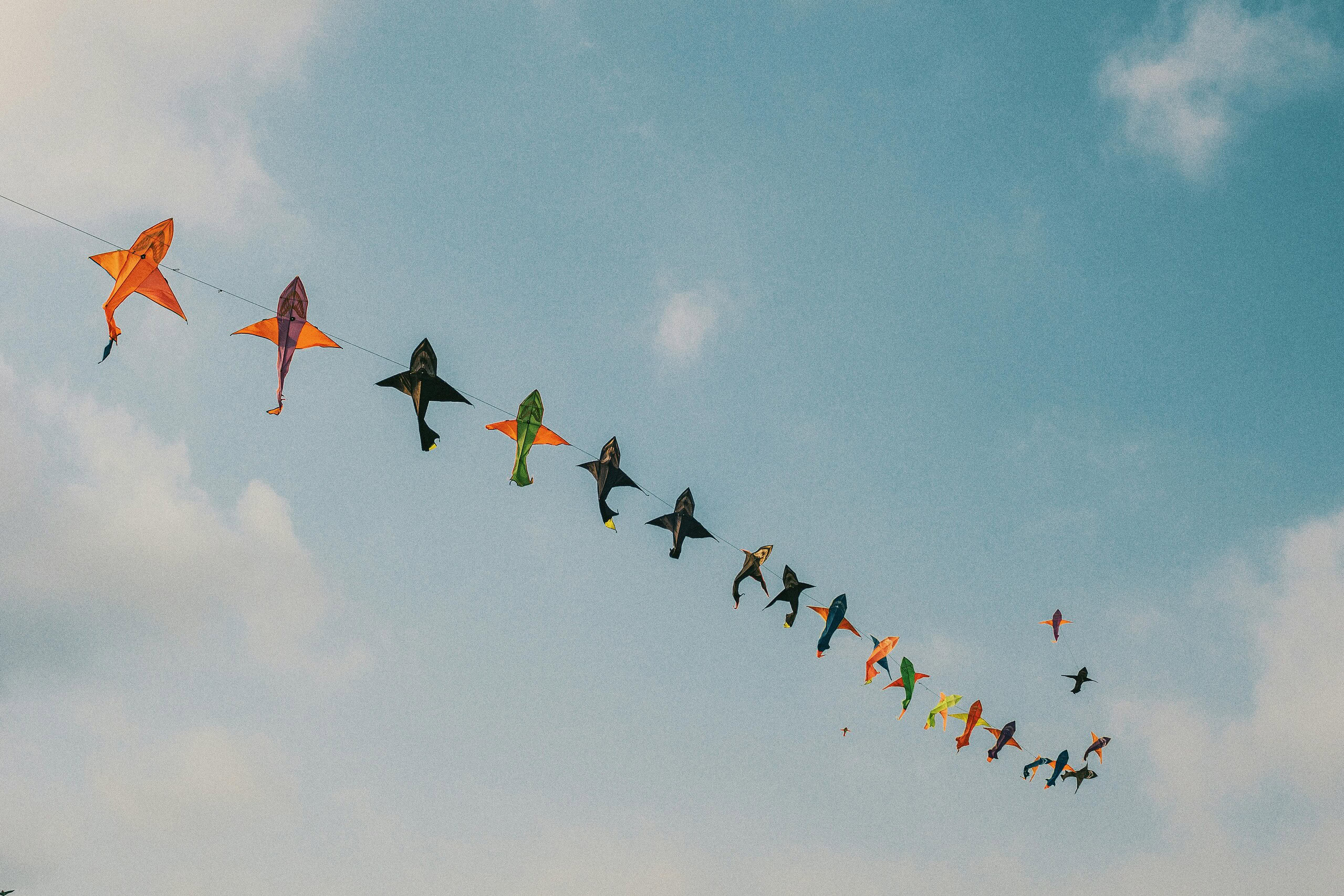 Colorful kites flying high at the Thailand International Kite Festival near Hua Hin.