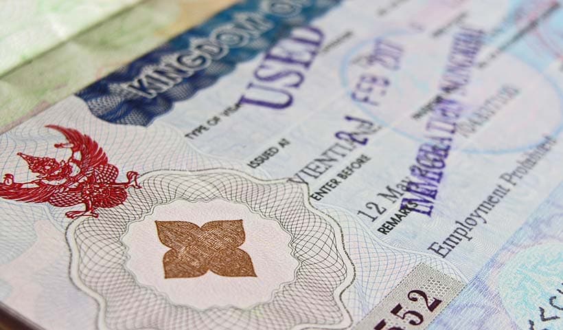 UK visa or passport document with official stamps and security features.